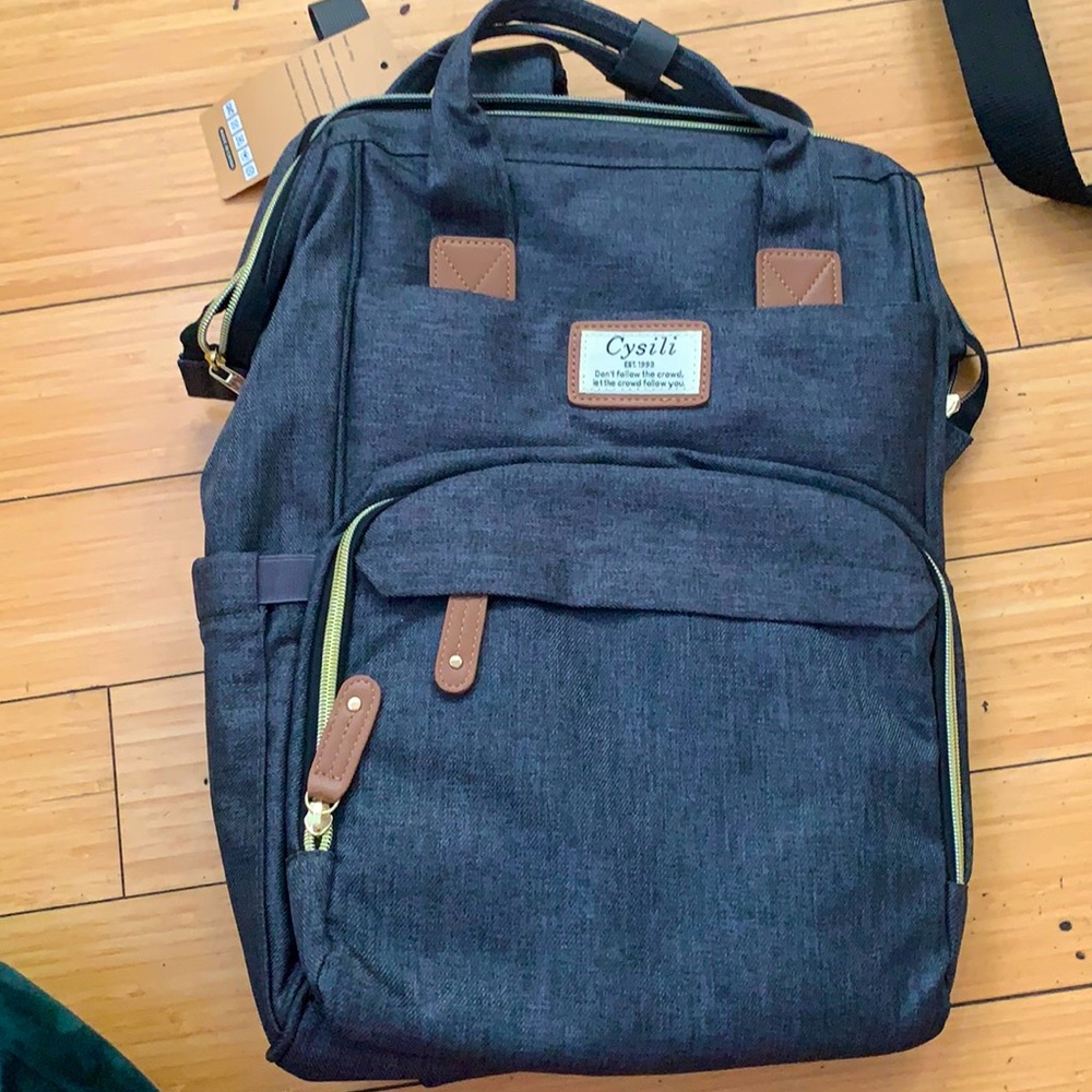 Unisex diaper bag. Never used with tags.